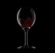 Wine glass with wine splash inside