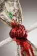 Wrinkled American Dollar Bleeding in Rope