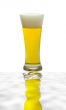 Beer glass isolated against white background
