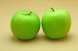 Two fresh green apples