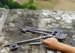 Child holding keys of Medieval castle