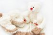 Wool hand-made baby coat, socks and teddy bear