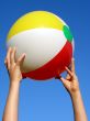 hands with beach ball