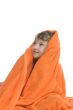 Boy in bath towel on white