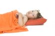 sleep little boy on white