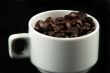 Coffee beans and cup