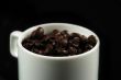 Coffee beans and cup