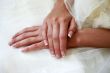 Hands of the bride