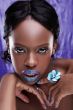 beauty african face with violet lips and nails