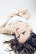 Young woman laying bed