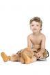 little boy play toy bear on white