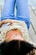 woman lying with book