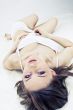 Young woman laying bed