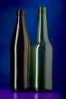 Glass bottle on blue