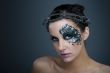 Girl with beautiful artistic face painting