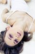 Young woman laying bed