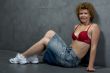 woman in red brassiere on wall