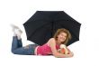 woman with umbrella and toy