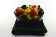 Cornflakes and Fruit in a Black Bowl
