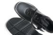 Black shoes on white close up