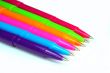 Multicolor pens on white background