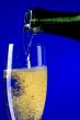 champagne glasses closeup on blue