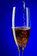 champagne glasses macro on blue
