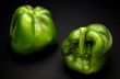 Two green sweet peppers