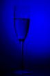 champagne glasses on blue
