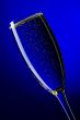 On blue background champagne glasses