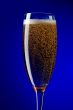 On blue champagne glasses closeup
