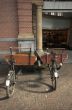 Two antique bicycle trailers