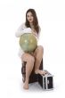 Young woman with  suitcase and globe