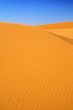 sand dunes and cloudless blue sky