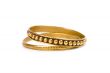 two golden bracelets