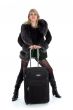 Beautiful blonde with valise