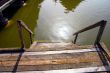Wooden stairs into water