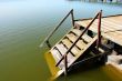 Wooden stairs into water