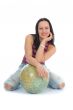 Young woman with  globe