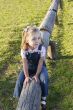 Small Girl Sitting on Log