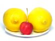 Two lemons and little apple.