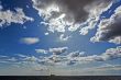 Single tanker ship far away in open sea