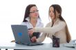 Two business woman work with laptop