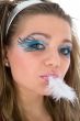 Girl with face-art butterfly paint
