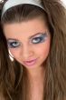 Girl with face-art butterfly paint