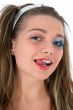 Girl with face-art butterfly paint