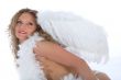 portrait of the nude blonde-angel with blue eyes
