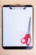 Blank clipboard scissors