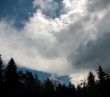  Storm clouds over the forest. Backlight