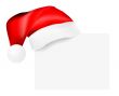 Santa`s cap hanging on a blank card